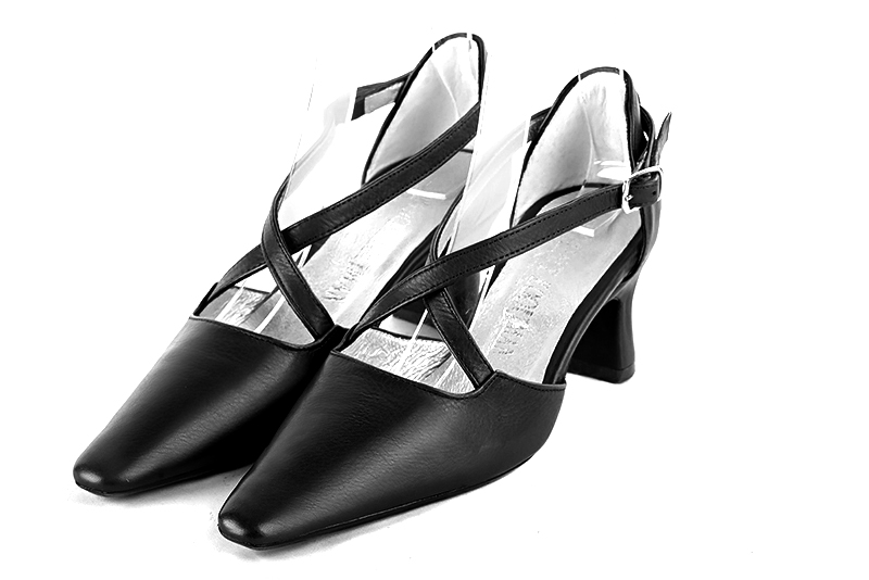 Satin black women's open side shoes, with crossed straps. Tapered toe. Medium spool heels. Front view - Florence KOOIJMAN